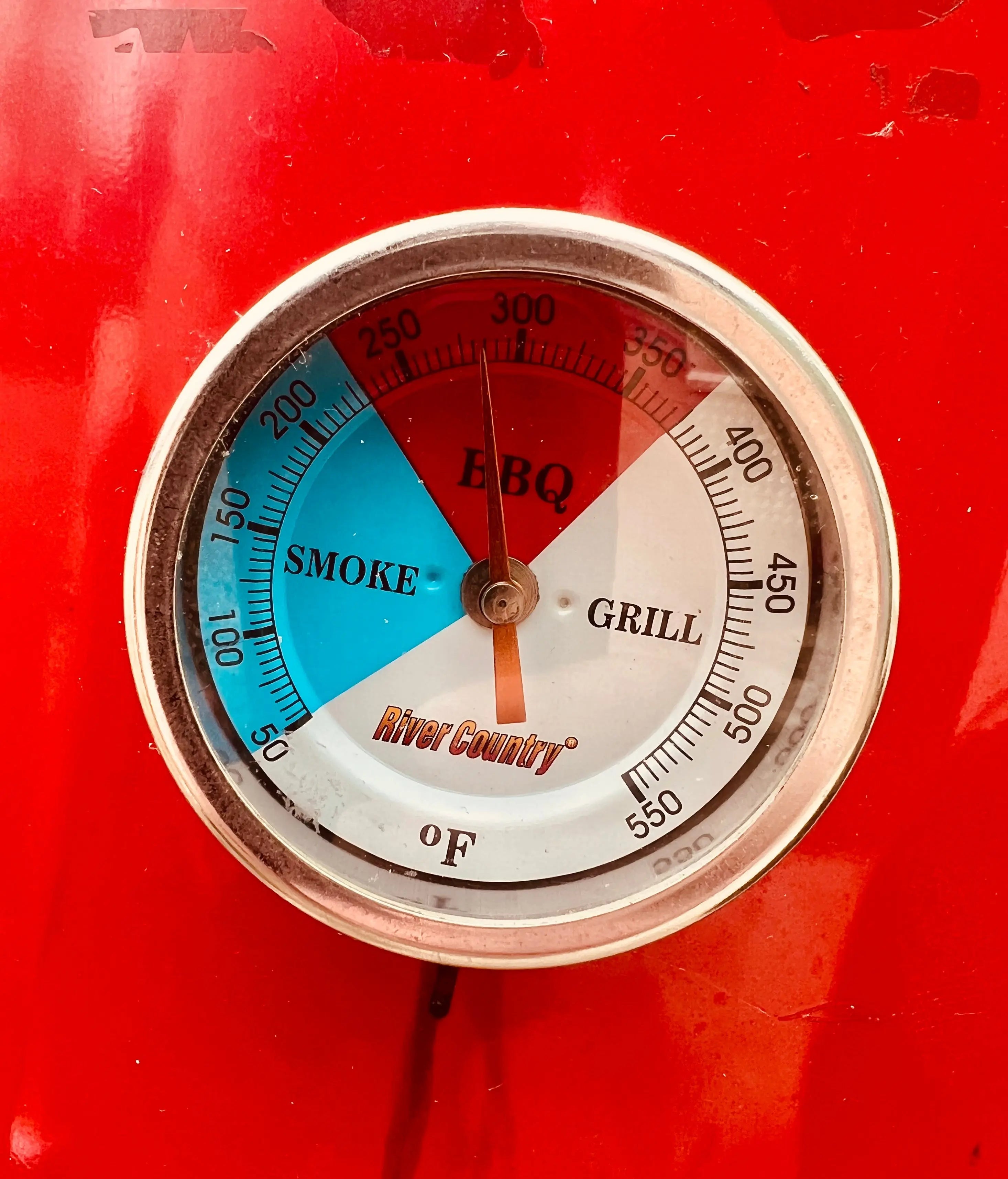 Temperature dial on a Butcher BBQ smoker