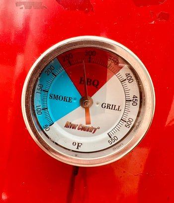Temperature dial on a Butcher BBQ smoker