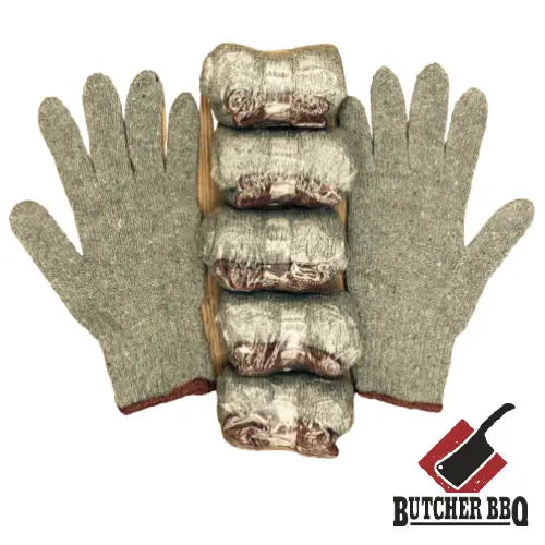 Pair of green gloves with a roll of butcher paper on a white background, featuring the Butcher BBQ logo.