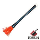 Barbecue brush with red bristles and black handle on a white background, featuring the Butcher BBQ logo.