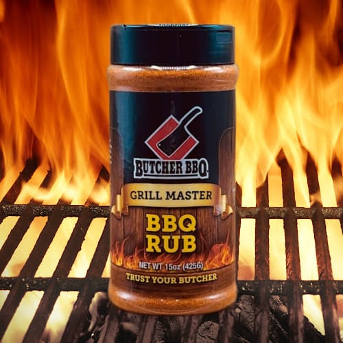 Butcher BBQ Grill Master BBQ Rub jar on a grill with flames in the background