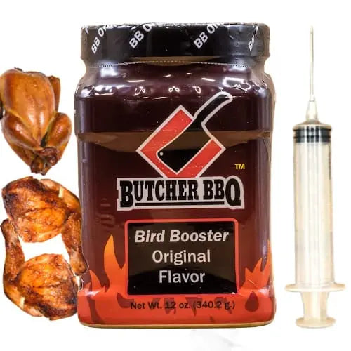 Butcher BBQ Bird Booster jar with roasted corn and chicken, and a syringe on a white background.