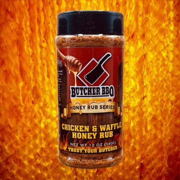 Butcher BBQ Chicken & Waffle Honey Rub jar on a fiery background