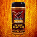 Butcher BBQ Garlic Honey Rub container on a fiery background