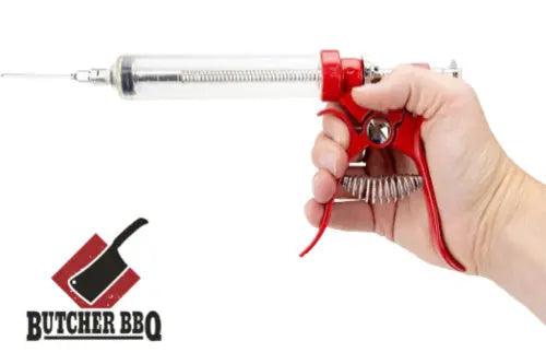 Hand holding a red syringe with a needle, branded 'Butcher BBQ', on a white background