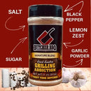 Butcher BBQ seasoning blend with labeled ingredients on a red background