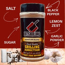 Butcher BBQ seasoning blend with labeled ingredients on a red background