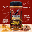 Butcher BBQ Pecan Honey Rub jar with ingredients listed on a red background