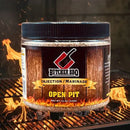Butcher BBQ Original Pork injection marinade jar on a grill with flames