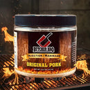 Butcher BBQ Original Pork injection marinade jar on a grill with flames