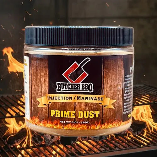 Butcher BBQ Original Pork injection marinade jar on a grill with flames