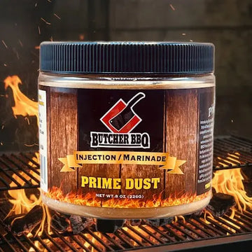 Butcher BBQ Original Pork injection marinade jar on a grill with flames