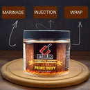 Butcher BBQ Prime Dust marinade jar on a wooden board with text labels 'Marinade', 'Injection', and 'Wrap'.