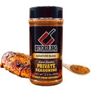 Butcher BBQ Private Seasoning jar with a spoonful of seasoning and grilled chicken on a white background