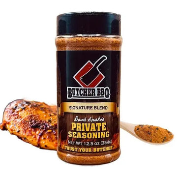 Butcher BBQ Private Seasoning jar with a spoonful of seasoning and grilled chicken on a white background