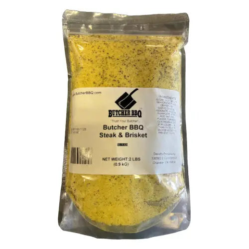 Packaged yellow BBQ seasoning with 'Butcher BBQ' label on a white background