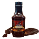 Bottle of Butcher BBQ sweet BBQ sauce with a label on a white background