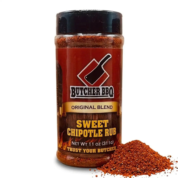 A bottle of Butcher BBQ Sweet Chipotle Rub seasoning with a black cap and a red label, shown on a white background with a pile of the reddish-brown spice blend in front.