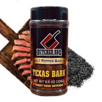Butcher BBQ Texas Bark seasoning jar with sliced steak on a wooden board
