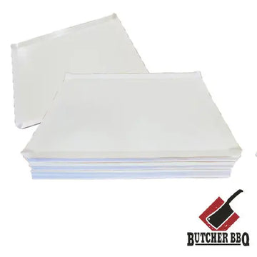 Stack of white paper sheets with a Butcher BBQ logo on a white background